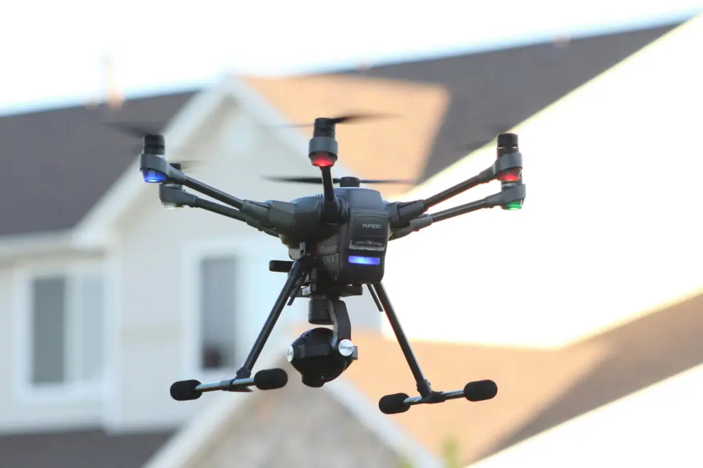 Drone flying over modren house